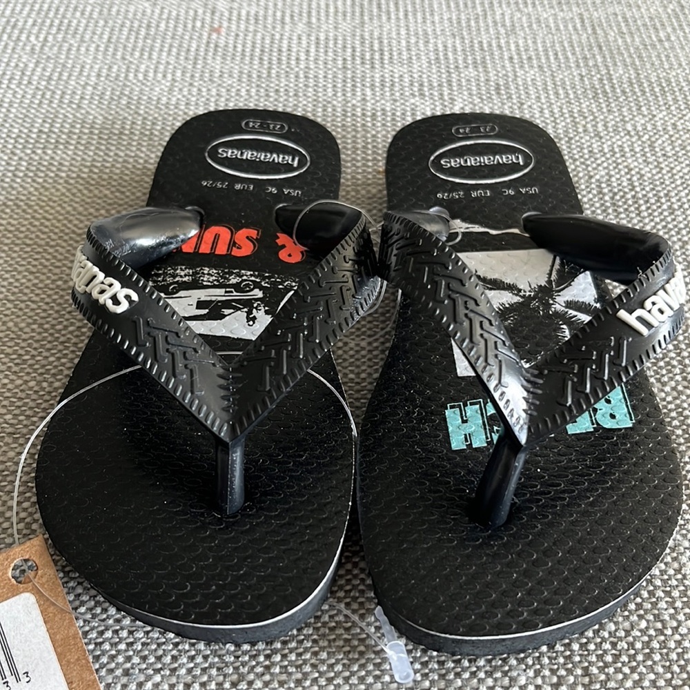 Havaianas Black Kids Flip Flops with Subtle Teal and Red Accents